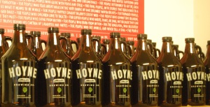 Growlers lined-up at Hoyne Brewing Company's Bridge Street location// Photo by Megan Cole
